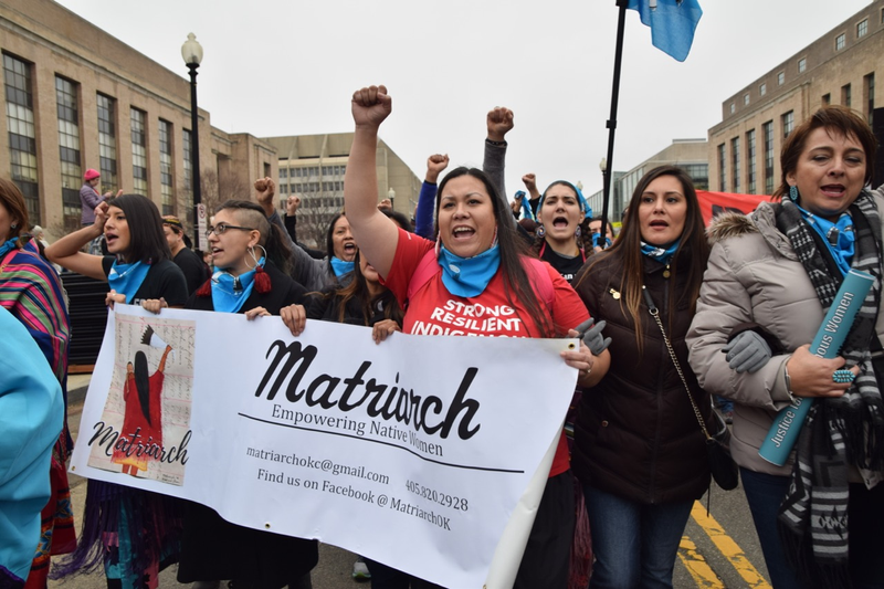 Jasha Lyons Echo-Hawk, far left, an activist from Oklahoma.